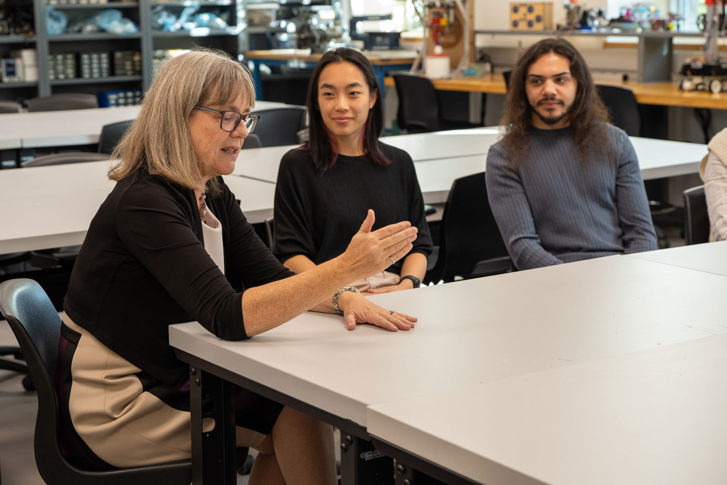 Donna Strickland talks to a few students