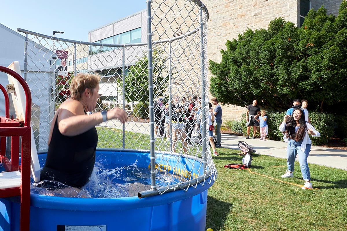 Heather Sheardown being successfully dunked in the dunk tank