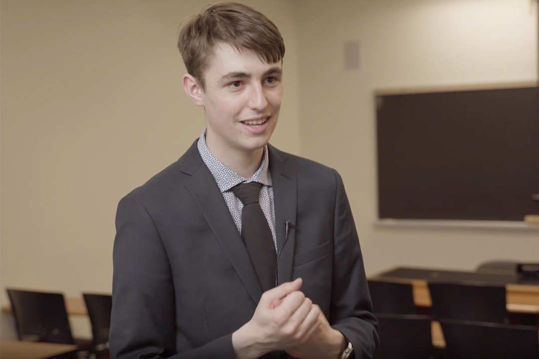 A McMaster engineering student in a suit